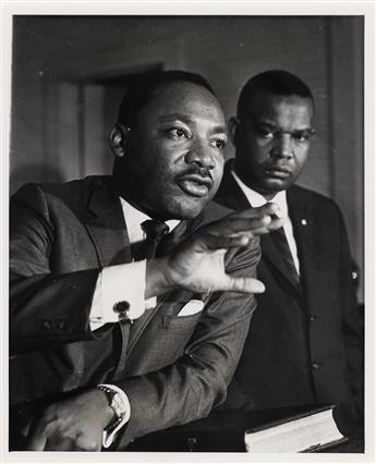 (MARTIN LUTHER KING JR.) A mini-archive with 28 iconic photographs of the important African American baptist minister and Civil Rights